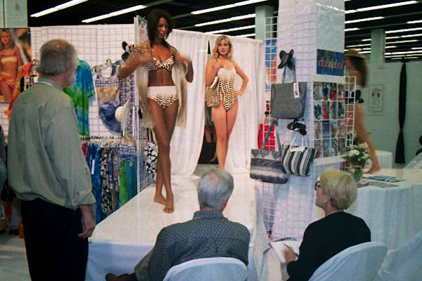 Models working at a swimwear trade show in Miami