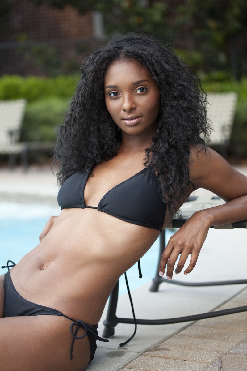 Hot young black girl using dildo