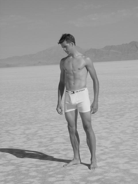 Male model photo shoot of greenestudios in salt flats