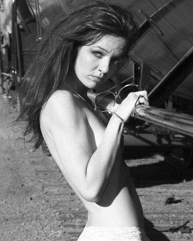 Female model photo shoot of La Mizelle in RR tracks, Denver