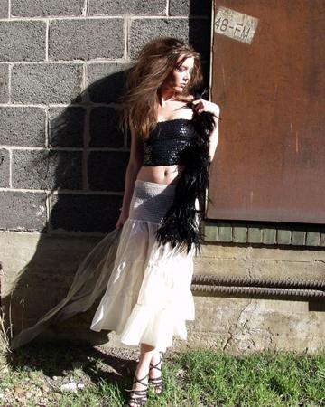 Female model photo shoot of La Mizelle in industrial Denver