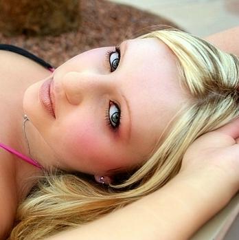 Female model photo shoot of Britt in pool side