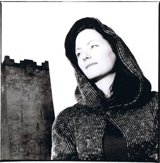 Female model photo shoot of emphotography in Dysert O'Dea Castle, Ireland.