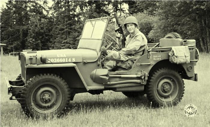 Male model photo shoot of p51 in Shelton, Washington, right after a parade. I took this myself with a tripod and timer, photoshopped with the WW2 Signal Corps insignia they used during the war. The M1928A1 Thompson IS original, but deactivated...