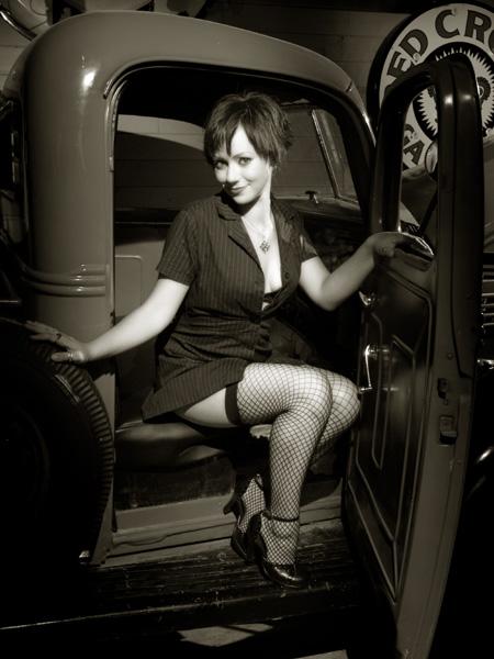 Female model photo shoot of insert stupid modelname in Hot Rod Garage, Martinez, CA
