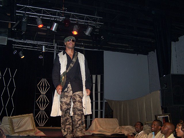 Male model photo shoot of theartiste in fashion show