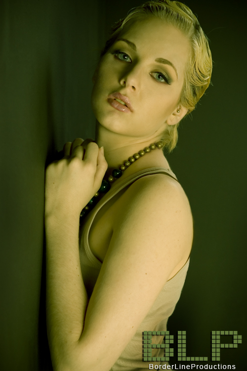 Female model photo shoot of Tew by Joseph D Castleberry in Chicago, hair styled by Metamorphosis Orange 
