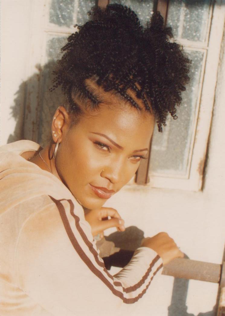 Female model photo shoot of Monica hair-mua