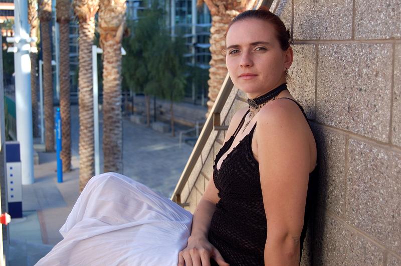Female model photo shoot of RED by jfscott103 in mesa arts center