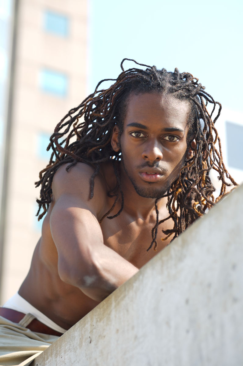 Male model photo shoot of Prince Zahran in Inner Harbor Baltimore