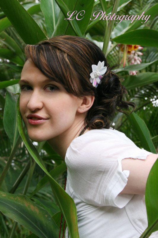 Female model photo shoot of Cydnie Owens by LCPhotography in Des Moines Botanical Center