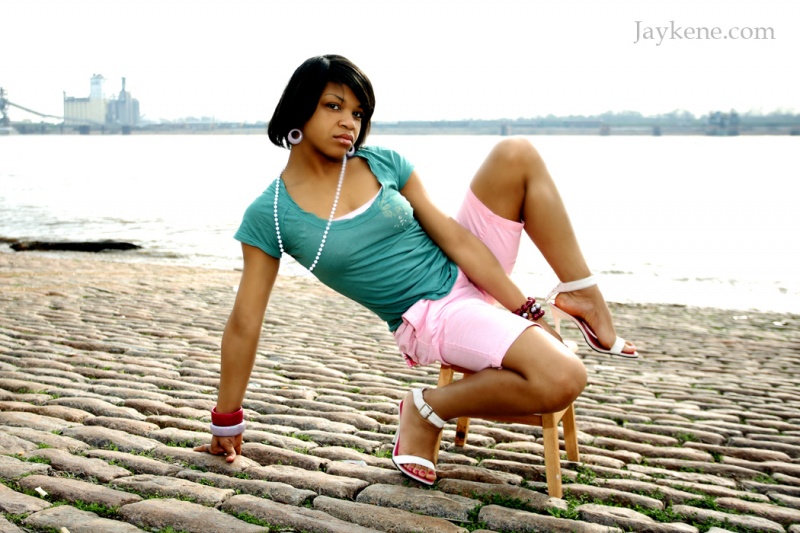 Female model photo shoot of Sade Albea in Saint Louis riverfront