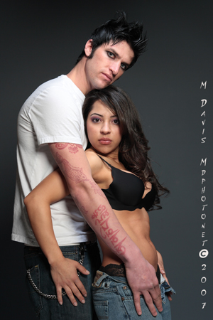 Male and Female model photo shoot of Flynrhinostudio and Valentina P in Toss the Box 4/14 , makeup by Brandy M Rich MUA