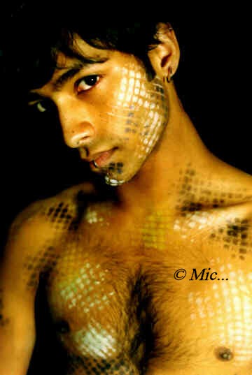 Male model photo shoot of Mic Photos