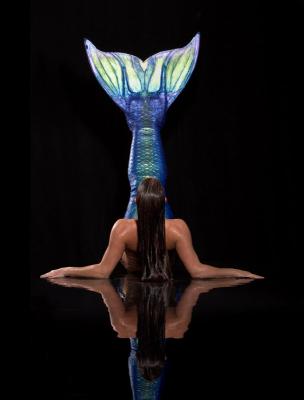 Female model photo shoot of Mermaid Sharkey in WayBeyond Productions/ Wet Reflection pool