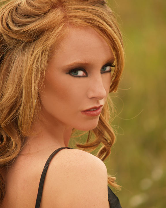 Female model photo shoot of Chealsie Ann in Prairie Park, makeup by Makeup by Sally