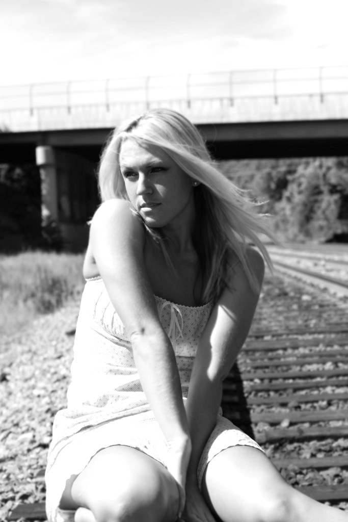 Female model photo shoot of Natalee Hayes by Joel Photo Art in train station