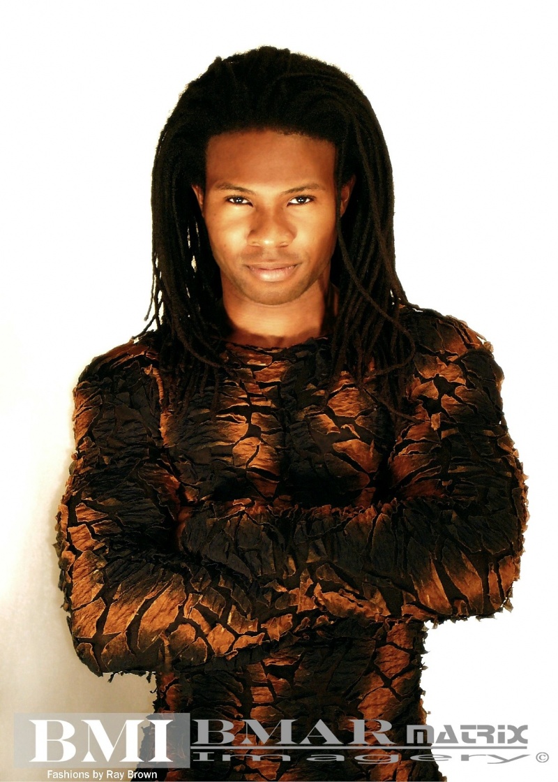 Male model photo shoot of Bmar Matrix Imagery and Norman Nu-Soul in Bmar Matrix Studio, clothing designed by Ray Vincente