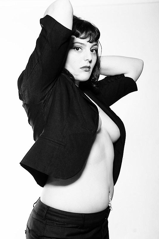 Female model photo shoot of tahereh in basement studio