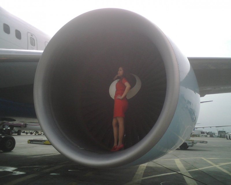 Female model photo shoot of TALIM in in a airplane engine