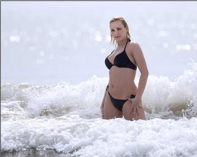 Female model photo shoot of Louise Neale in beach