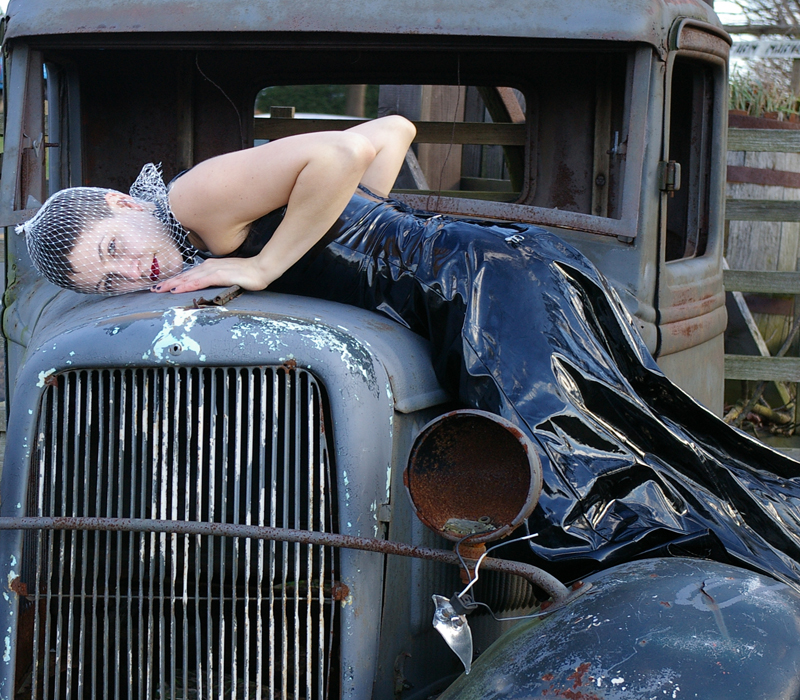 Female model photo shoot of Catapillar Girl by mooreno in On a truck