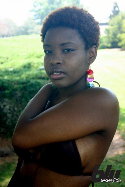 Female model photo shoot of   AFRICAN  QUEEN