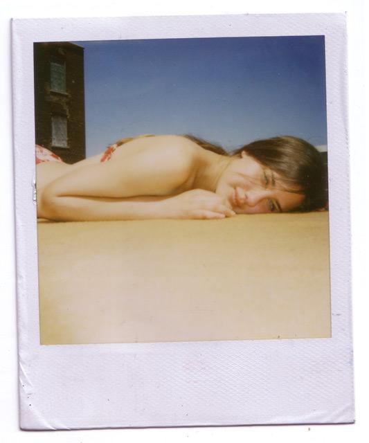 Female model photo shoot of Sample Polaroids