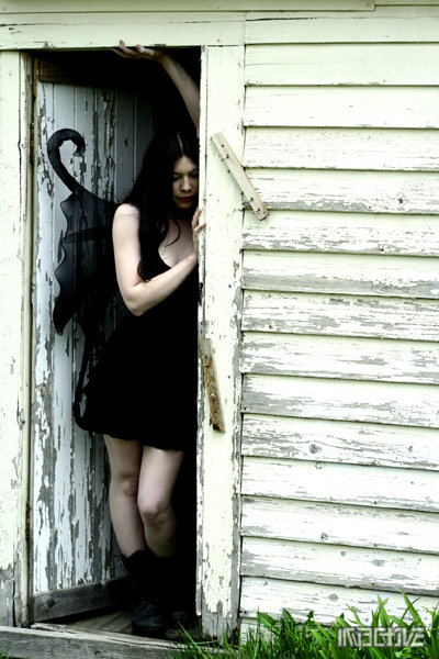 Female model photo shoot of Invective Photography and A Vengeance