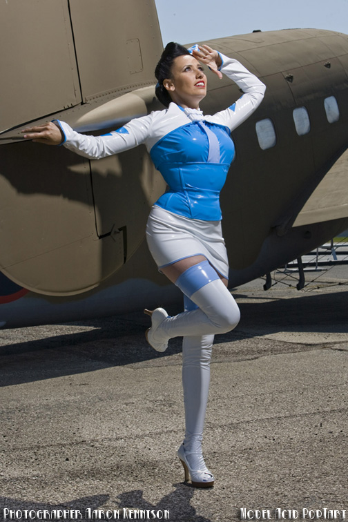 Female model photo shoot of Acid PopTart by Aron Nagy Studio in Dayton Air Force Museum, clothing designed by Artifice Clothing