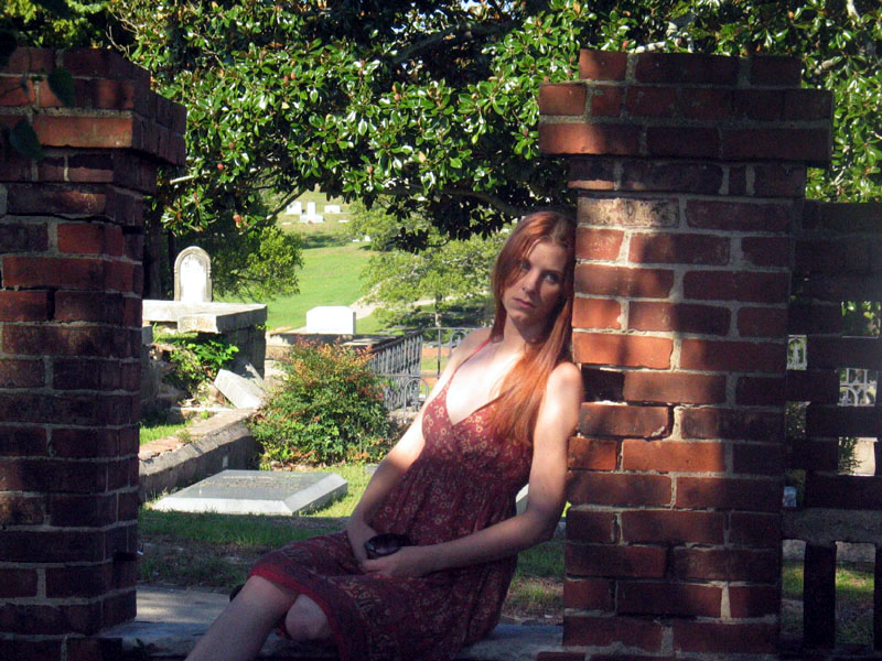 Female model photo shoot of Rachel McGalliard in Rose Hill Cemetery Macon Ga.