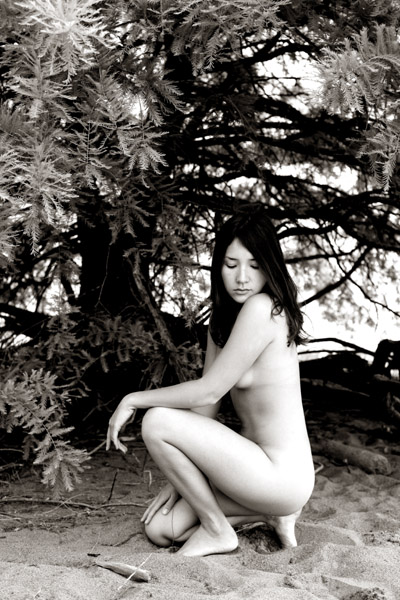 Female model photo shoot of jomama0324 in under the conifer