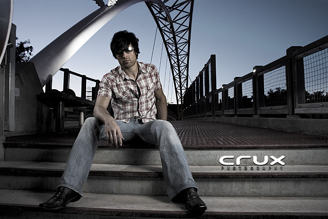Male model photo shoot of CruxPhotography in 16th Street Bridge over I-25 Downtown