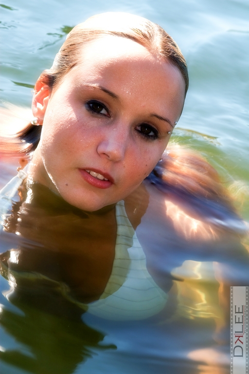 Female model photo shoot of Katie Bunny in james River