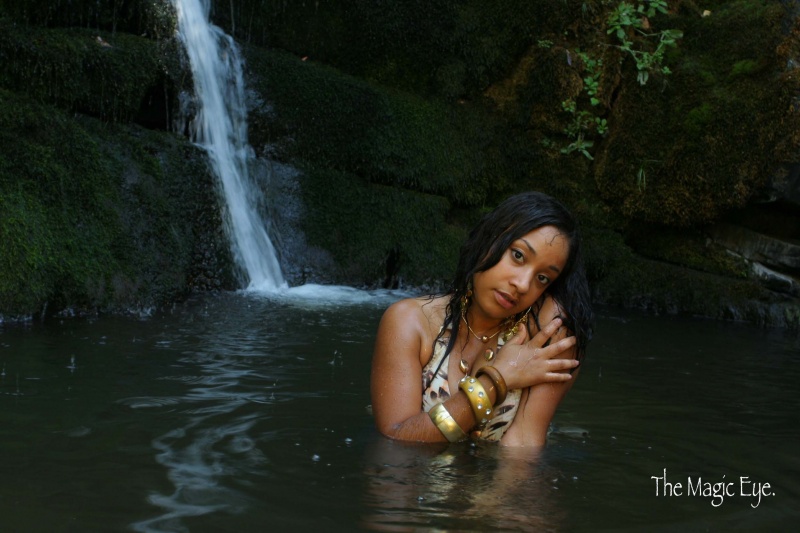 Female model photo shoot of miss anonymous in waterfall