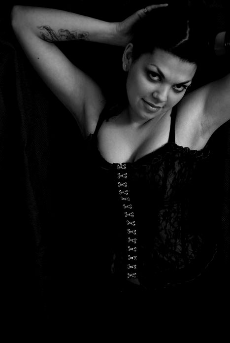 Female model photo shoot of Hells-Angel in Dark room