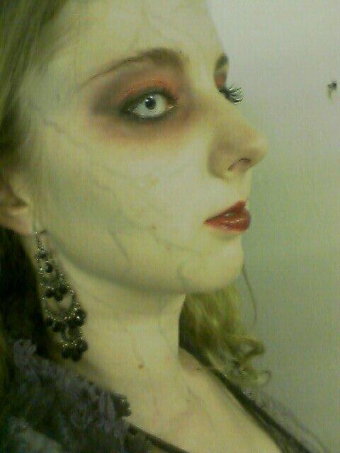 Female model photo shoot of MJ Art in Rocky Point Haunted House, make-up room