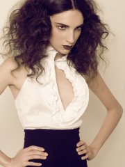 Female model photo shoot of Zerina by redlight district, hair styled by LEO ELEY , makeup by Graylon Everett