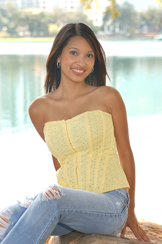 Female model photo shoot of Criselle  in Lake Eola, Orlando.