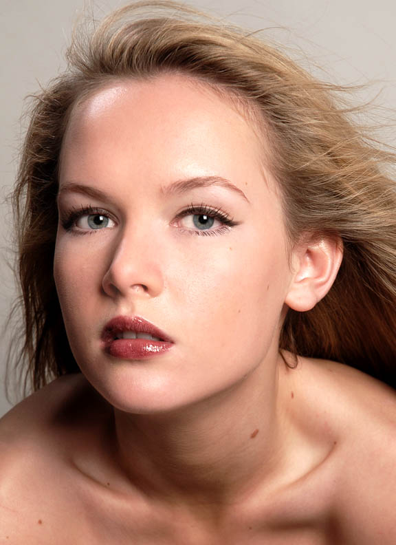 Female model photo shoot of Lara Photographie in school studio, makeup by beau monde