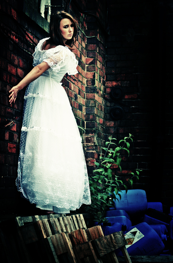 Female model photo shoot of Jade Davies by Lara Jade in old industrial estate