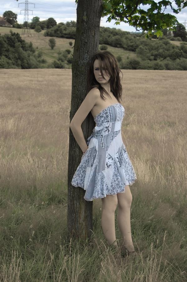 Female model photo shoot of Jade Davies in field, 