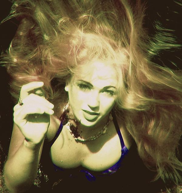 Female model photo shoot of underwater model in Freshwater spring in Florida