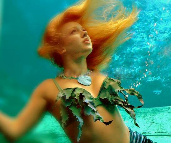 Female model photo shoot of underwater model in Weeki Wachee Florida