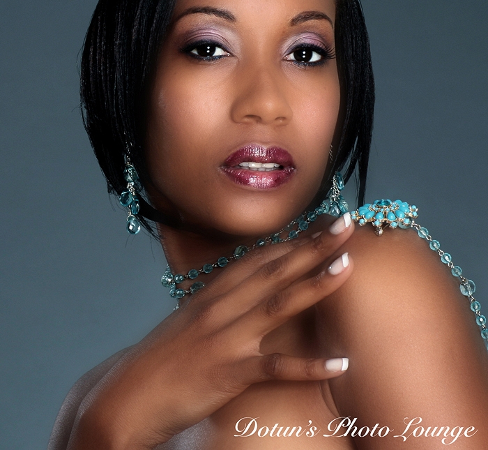 Female model photo shoot of FACES by T and N Aissa by Dotun