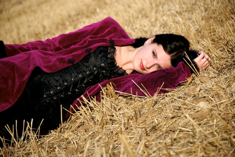 Female model photo shoot of Forsaken desire in A field near box woods
