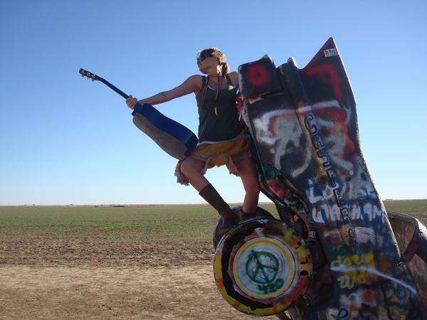 Female model photo shoot of Jess Kinnick Wesley in Cadillac Ranch, Texas