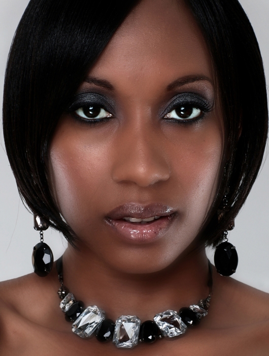Female model photo shoot of FACES by T and N Aissa by Dotun