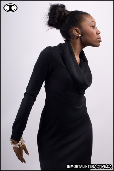 Female model photo shoot of Nnenna A in studio