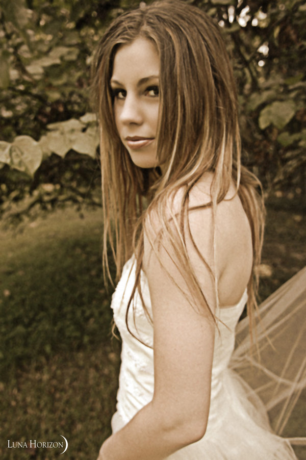 Female model photo shoot of Maegan Shutter in Cypresswood Graveyard 